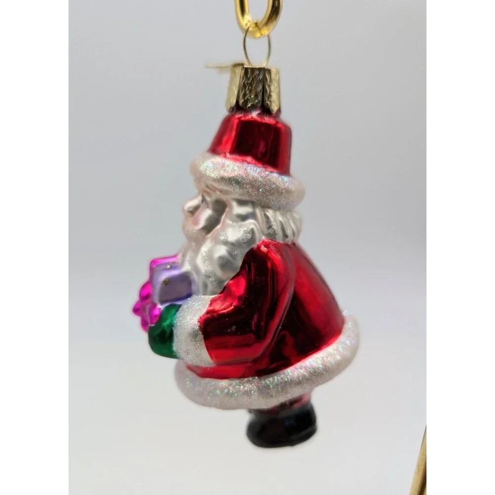 OLD WORLD CHRISTMAS Blown Glass Santa Claus Holding Gift Ornament 4